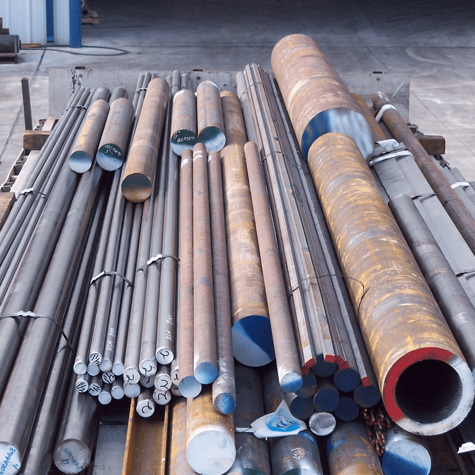 A pile of steel rods and bars on top of each other.